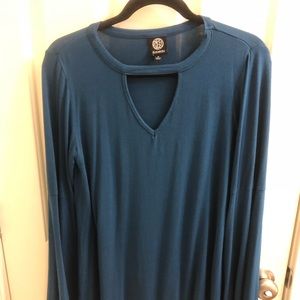 Dark teal women’s blouse with bell sleeves